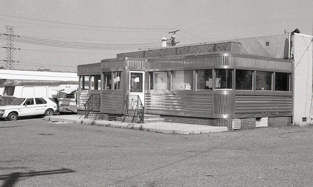a black and white photo of an unknown new jersey diner from the 80s