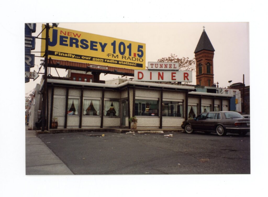 The Tunnel Diner just outside the Holland Tunnel, Large Jersey 101.5 FM advertisement sits above it