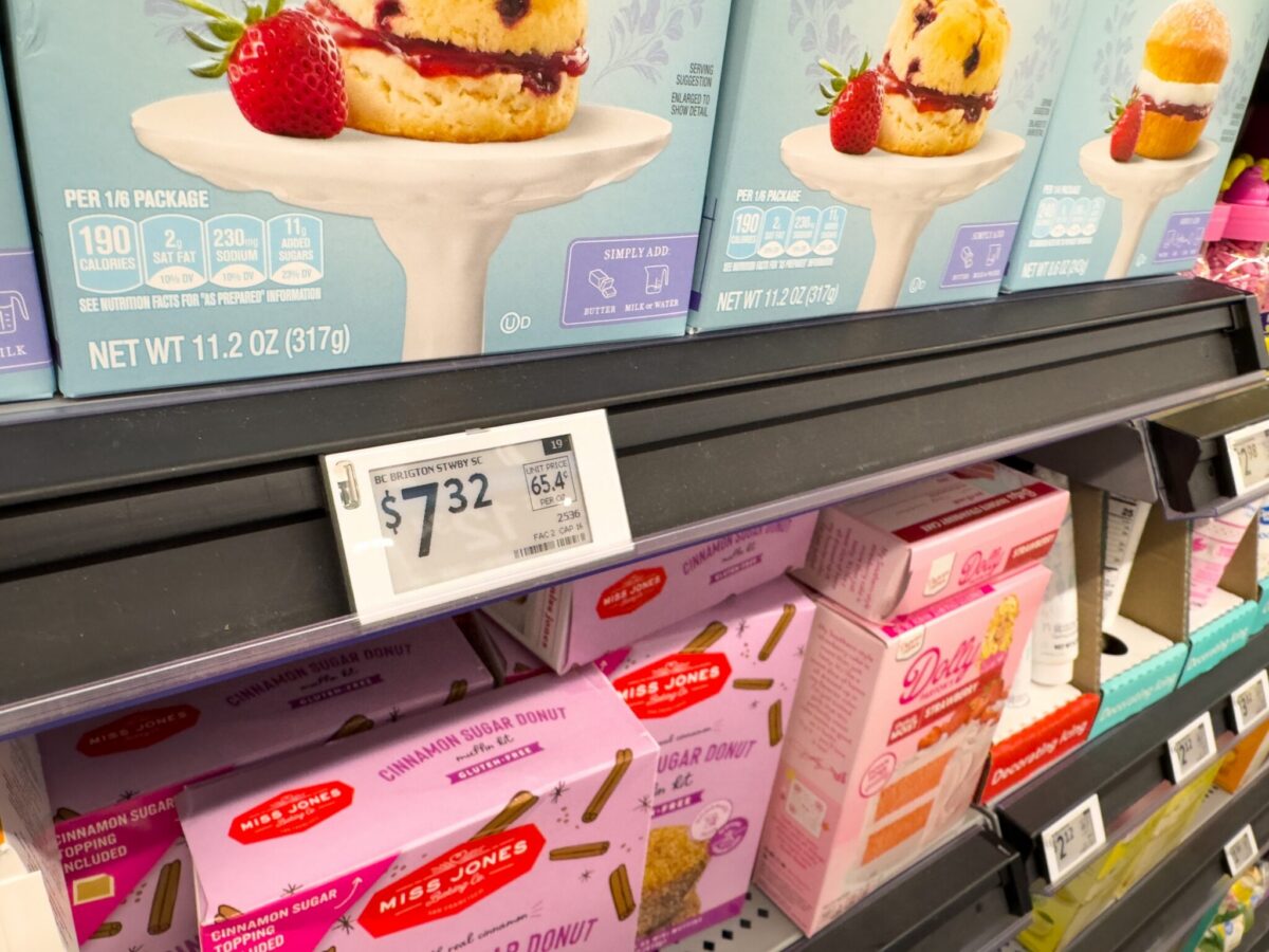 A digital electronic shelf label displaying a price on a Walmart grocery shelf, representing the surveillance pricing technology New Jersey is moving to ban