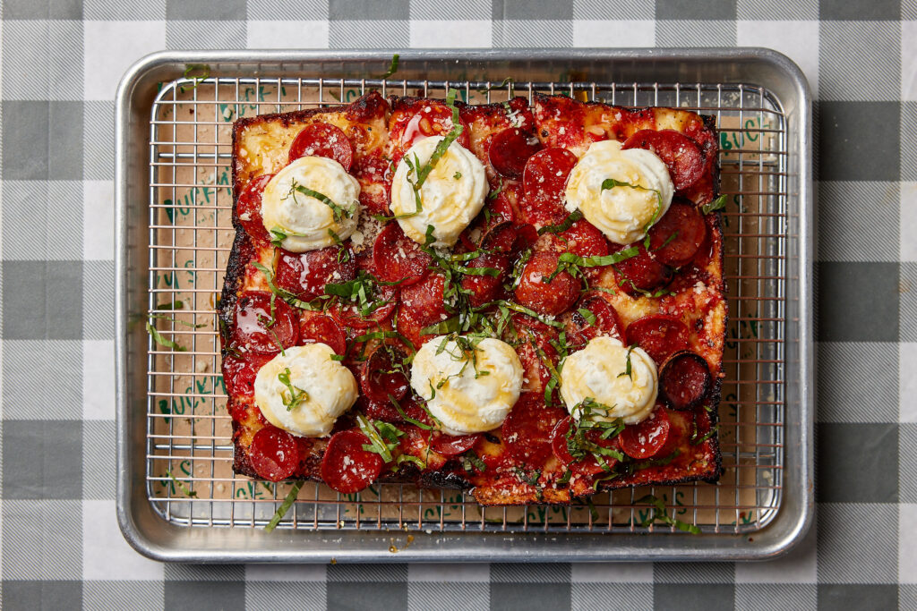 Detroit pizza with pepperoni and ricotta at Bucky's Pizza in Chatham