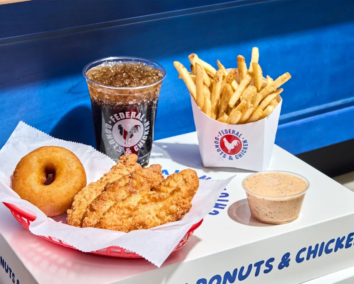 Fried chicken tenders, a donut, fries, and a drink from Federal Donuts and Chicken