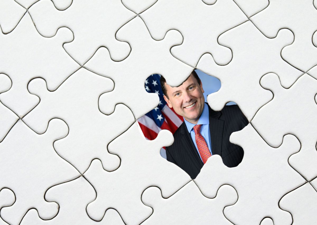 An illustration showing Rep. Tom Kean Jr. visible through a missing puzzle piece