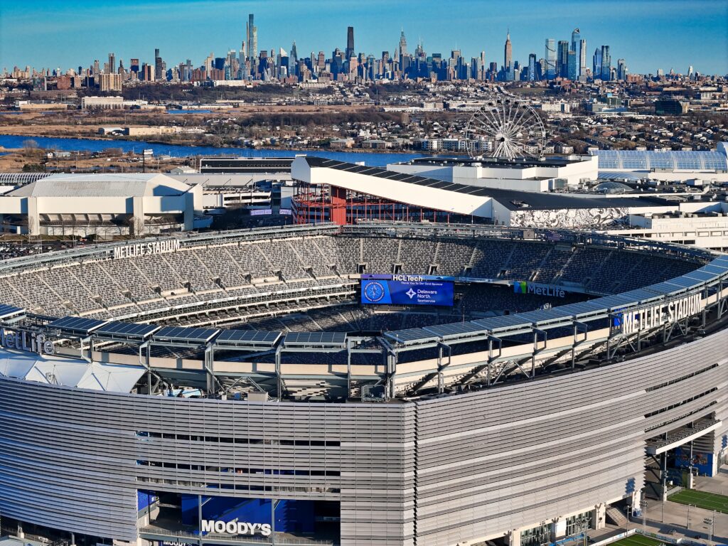 Aerial view of MetLife Stadium in East Rutherford, New Jersey with the Manhattan skyline in the background
