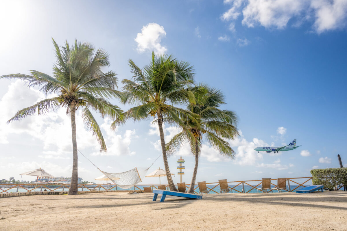 A plane flying low over Maho Beach near Sonesta Maho Beach Resort in St. Maarten