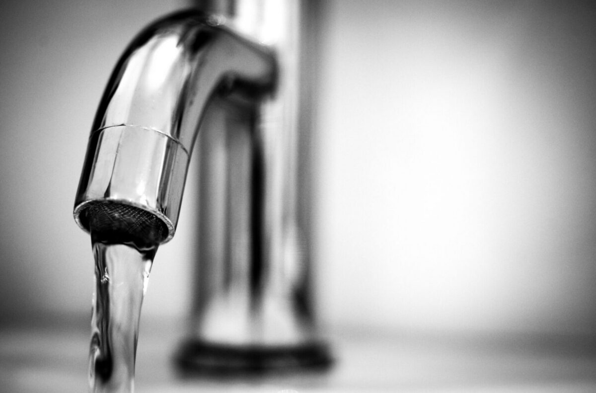 Water running from a faucet, representing the PFOA contamination affecting Florence Township, New Jersey's water supply