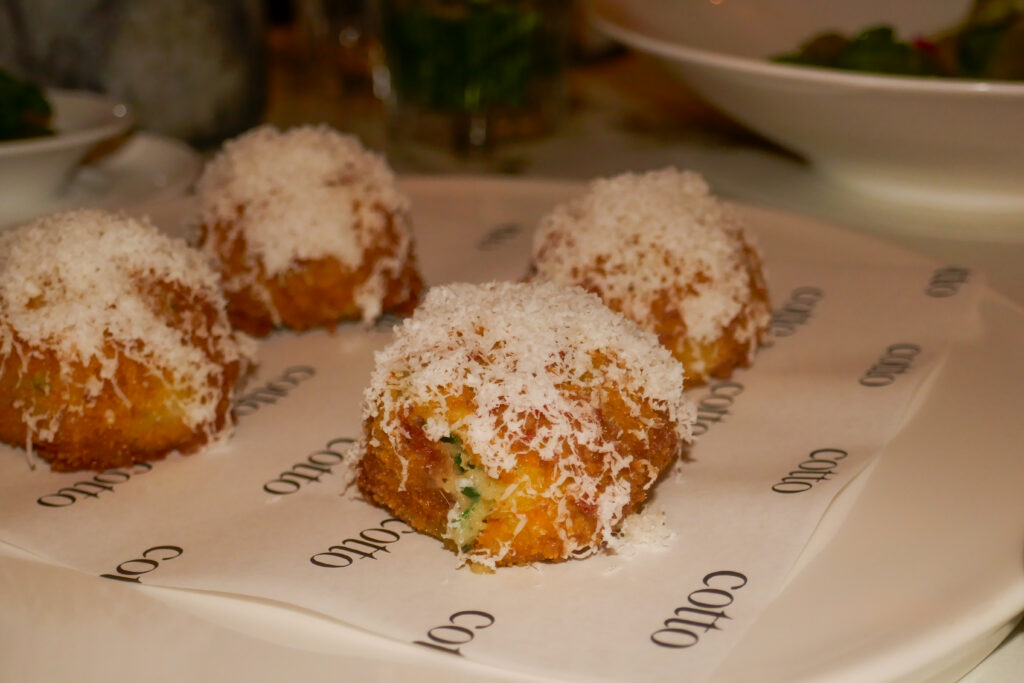 4 crispy potato and leek croquettes, topped with parmigiano cheese