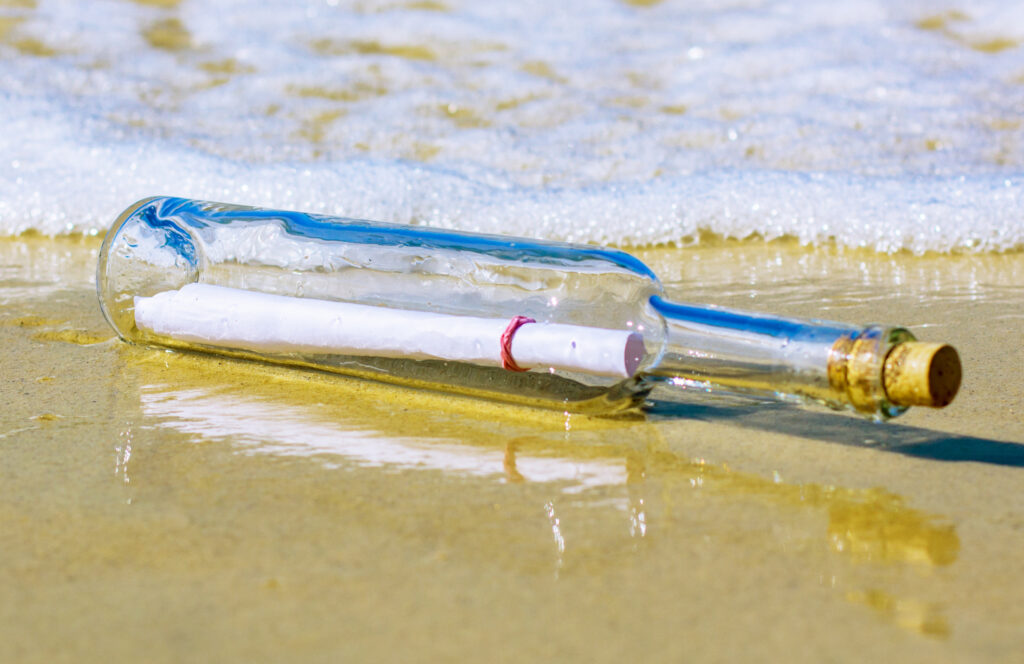 A message in a bottle washed up on a beach, similar to the one found in the wetlands of Upper Township, New Jersey