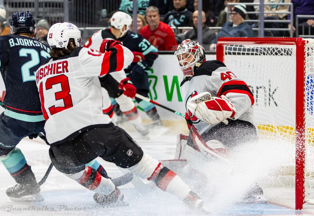 New Jersey Devils captain Nico Hischier in action against the Seattle Kraken during the 2023-24 NHL season.