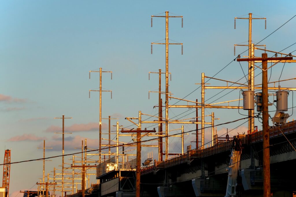 Power lines and transmission infrastructure in Kearny, New Jersey, at sunset