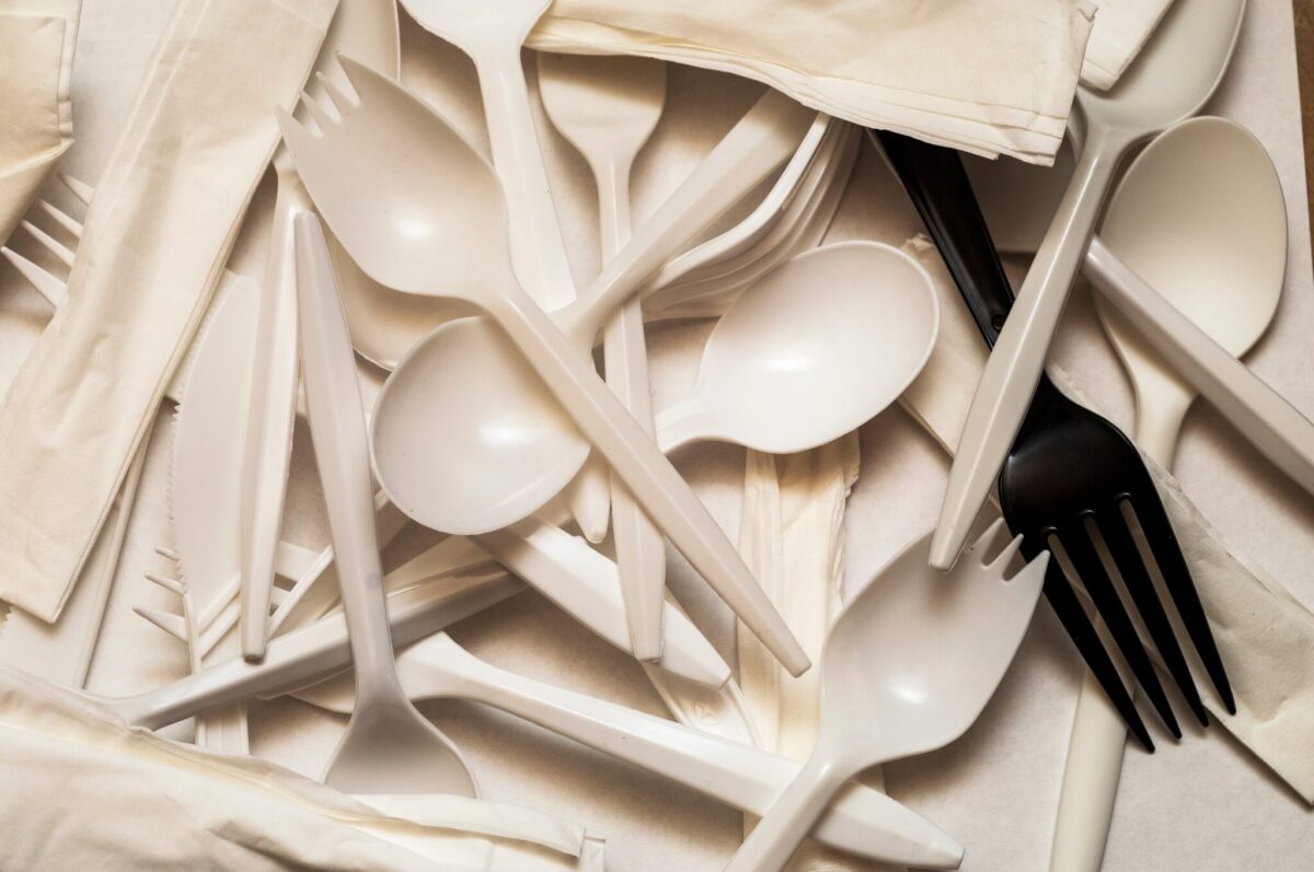 A collection of single-use plastic utensils, the type now restricted under New Jersey's new Skip the Stuff law.