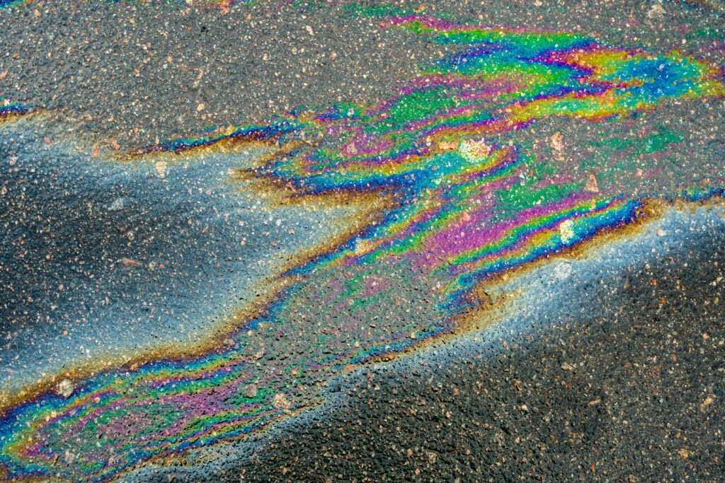 An oil sheen, illustrating the type of diesel contamination reported at a Secaucus data center's spill into Anderson Creek