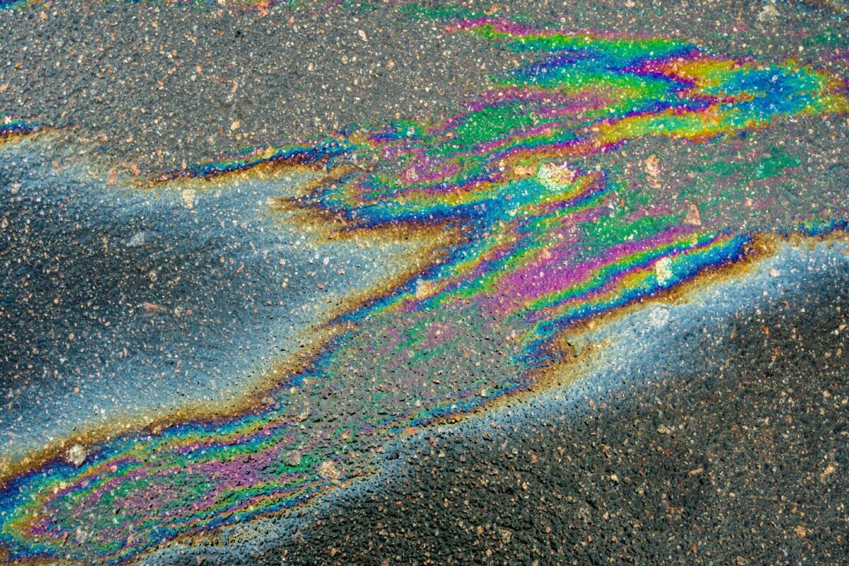 An oil sheen, illustrating the type of diesel contamination reported at a Secaucus data center's spill into Anderson Creek