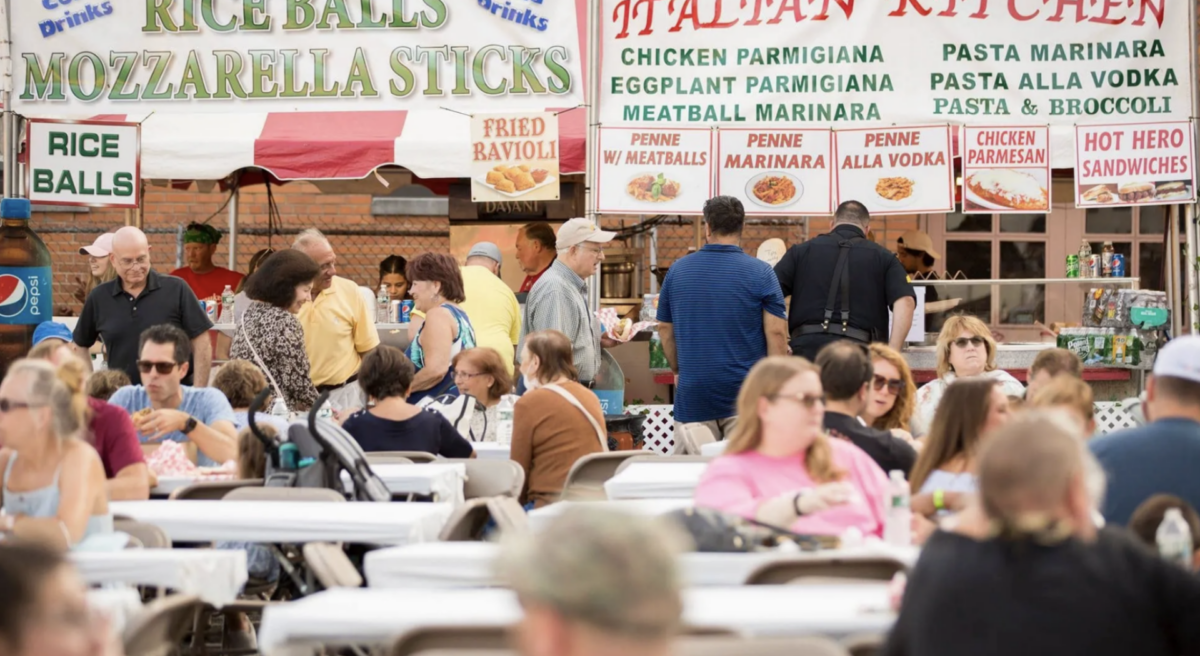 people gathered at St. Bart's/UNICO Italian Festival in Scotch Plains, NJ