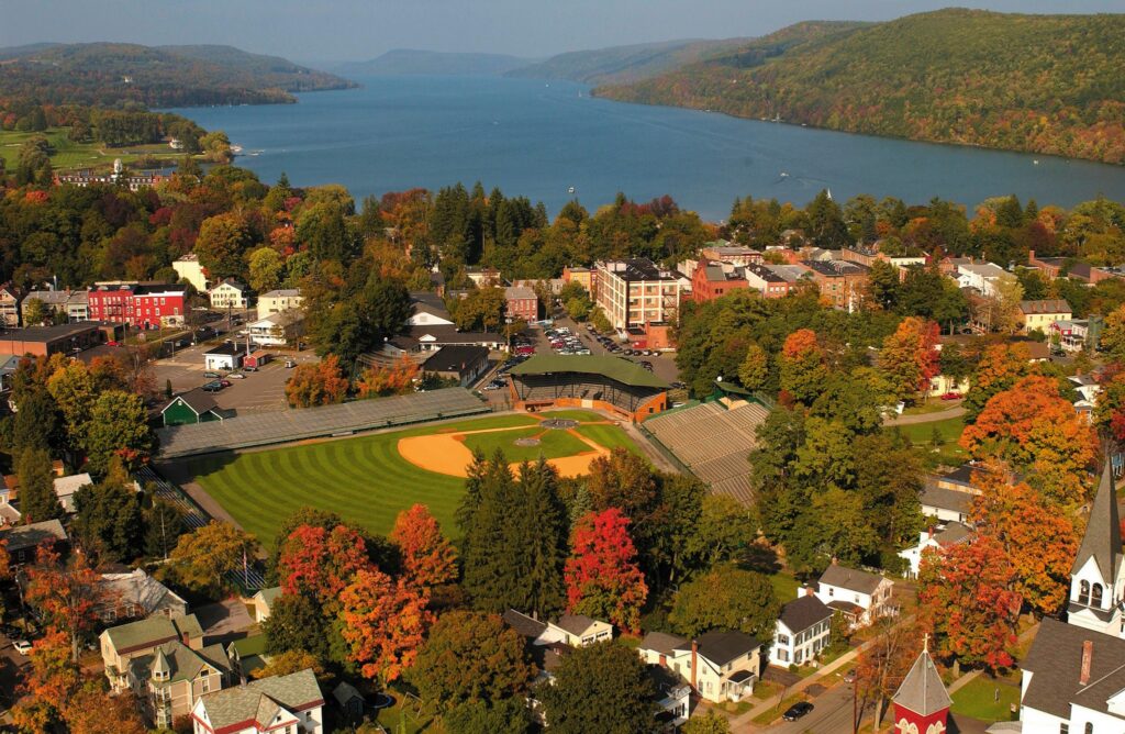 an aerial view of a baseball field in Cooperstown during the fall
