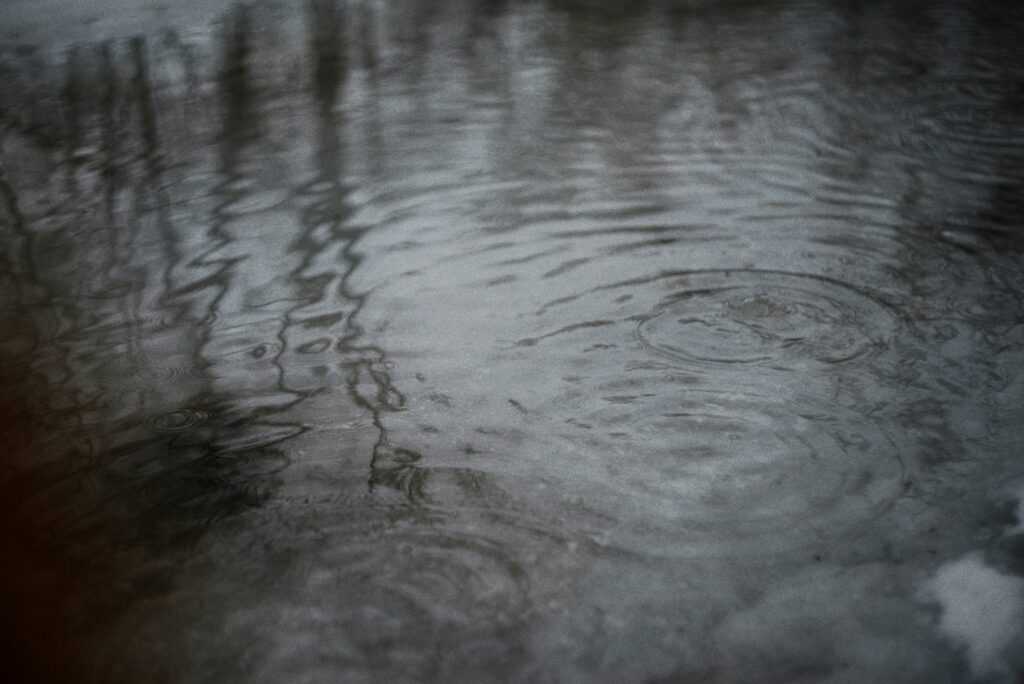 a storm puddle, representing potential NJ flooding during a nor'easter this week