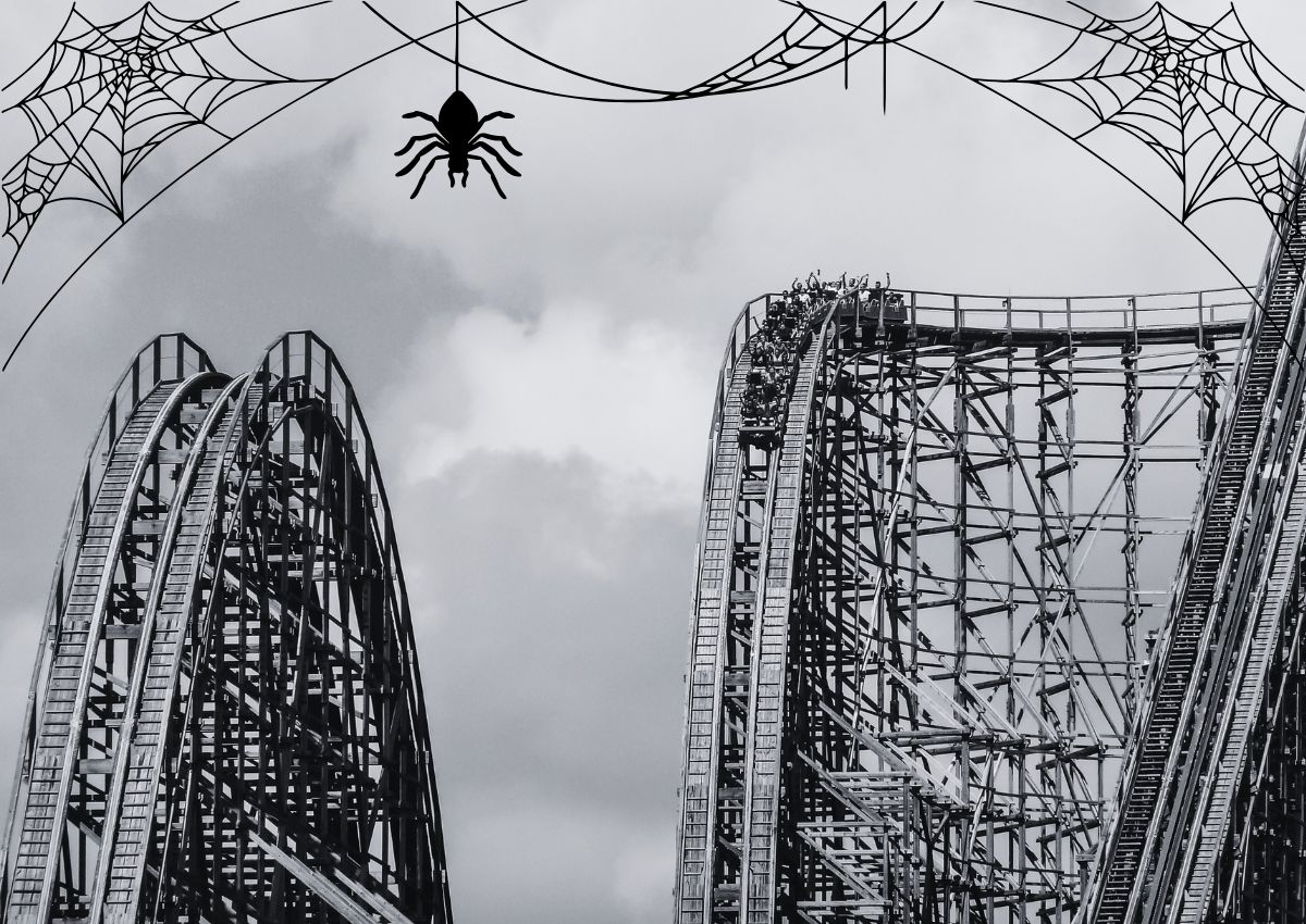 El Toro roller coaster at Six Flags Great Adventure in Jackson, NJ in black and white with spider webs coming down from the top, fright fest depiction